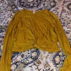 yellow crop top.